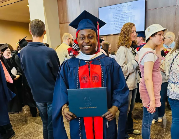 Odinakachukwu Ezeh poses for a picture during graduation/Instagram @odinakachukwu_ezeh