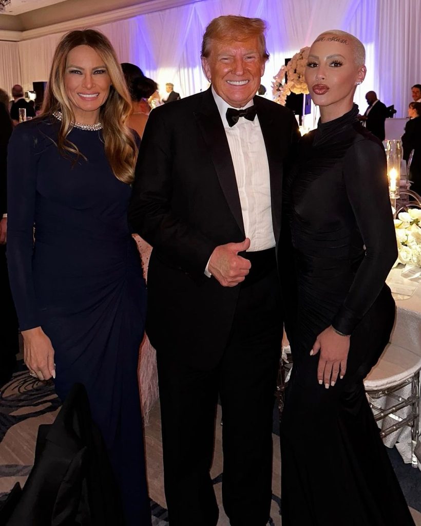 Amber Rose (Extreme right) poses for a picture with Donald and Melania Trump/ Instagram @amberrose