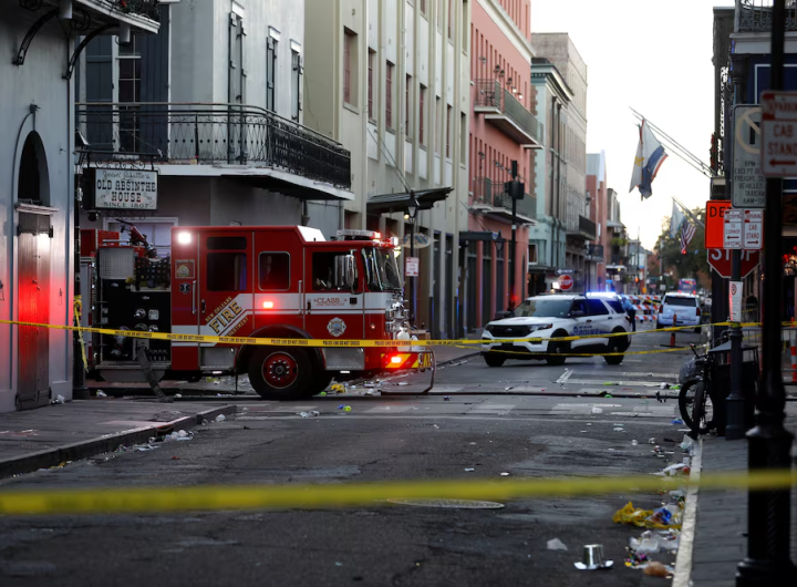 A fire truck and a US police vehicle stationed near the attack site/Reuters